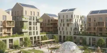 Modern residential complex with green spaces, symbolizing new federal housing solutions.